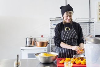 Camilla Wynne in the kitchen making preserves