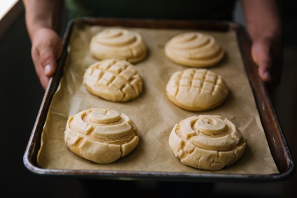 Sheet pan of unbaked Conchas de Maíz